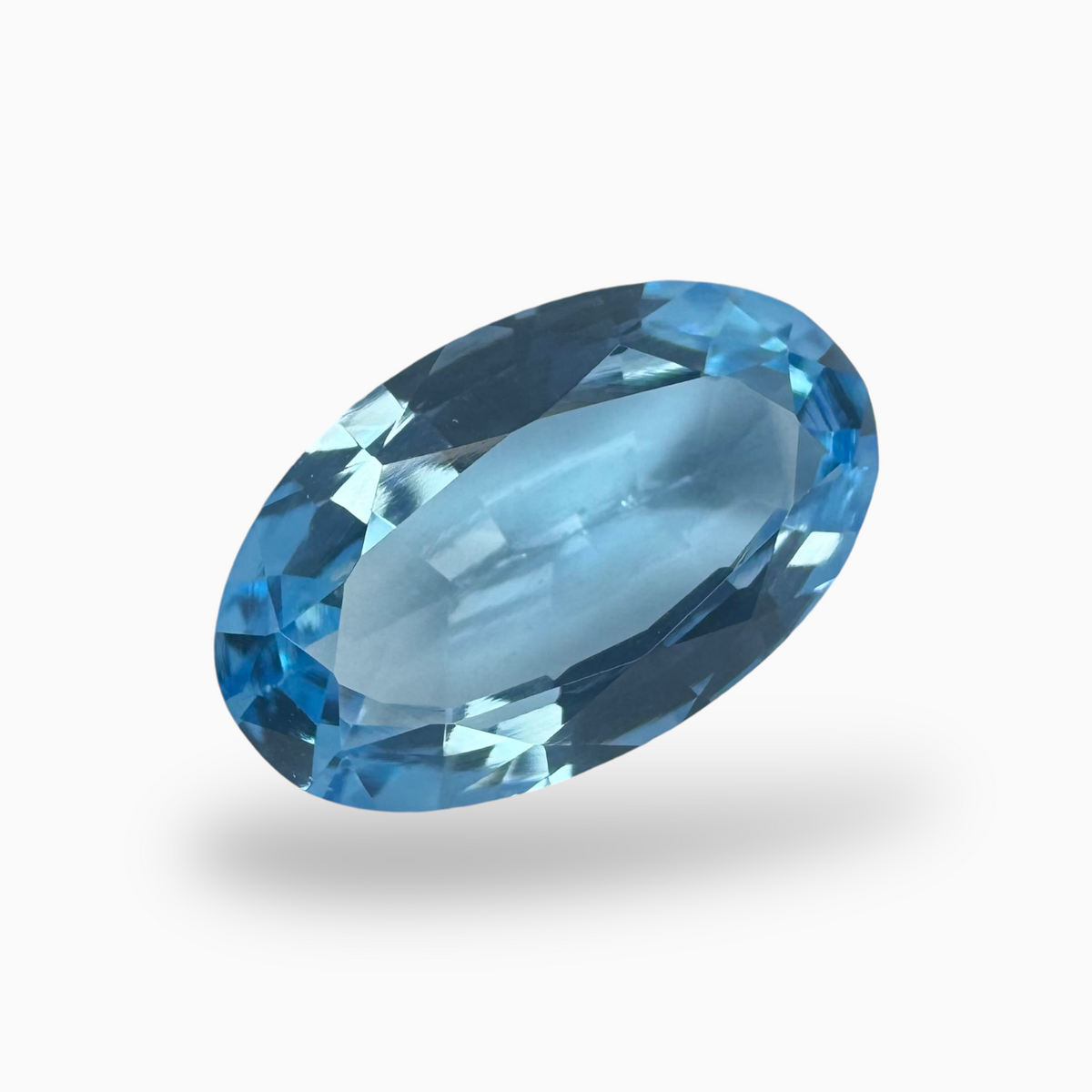 Swiss Blue Topaz 13.32 Carats Oval Shape Size 19X12mm Deep Sky Blue Color