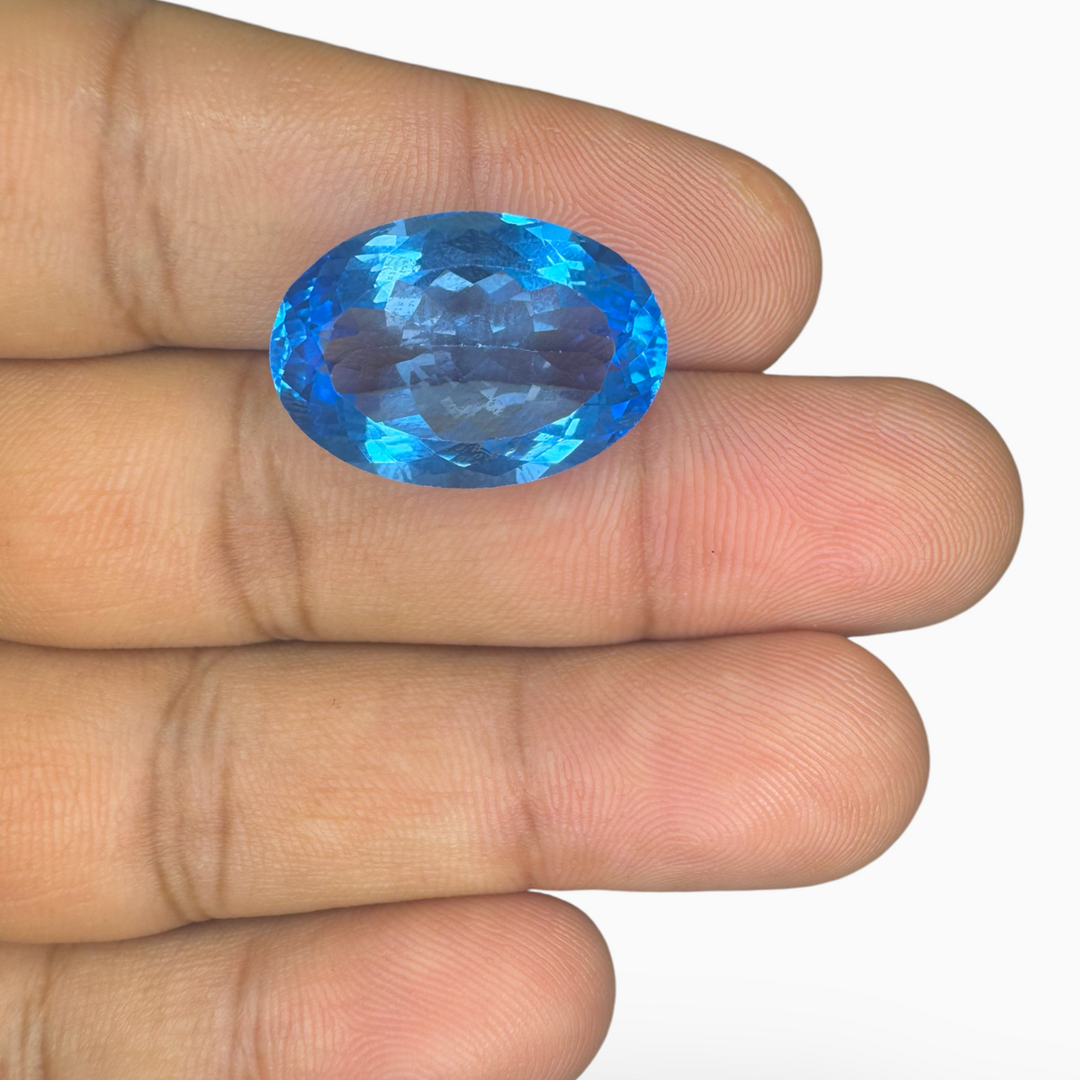 Buy Swiss Blue Topaz 21.02 Carats Oval Shape Size 20.8X14.5mm
