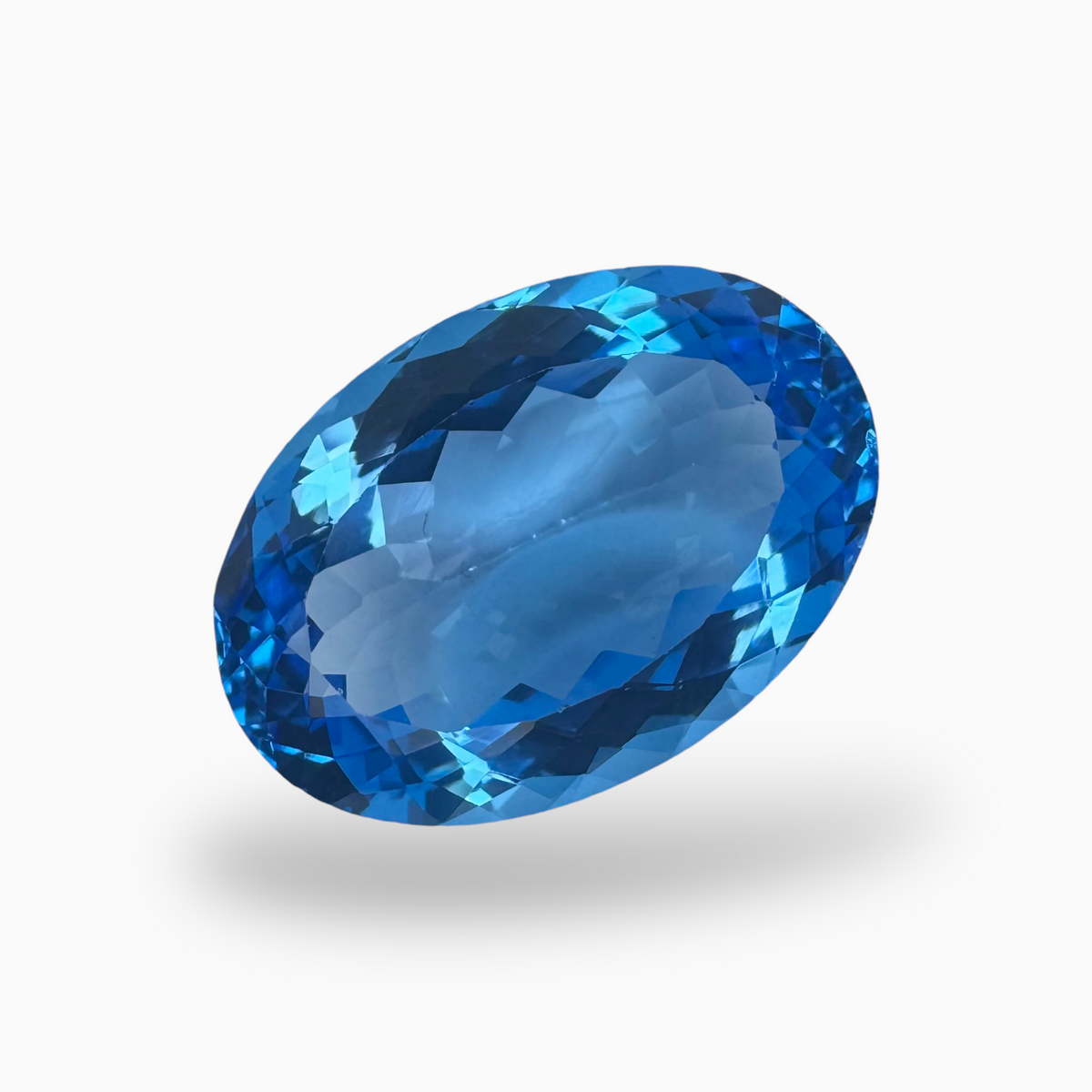 Buy Swiss Blue Topaz 21.02 Carats Oval Shape Size 20.8X14.5mm