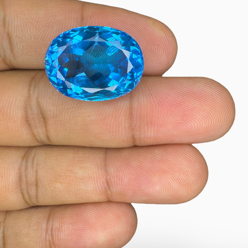 Deep Swiss Blue Topaz Oval Shape 27.90 Carats Stone Size 20X15mm