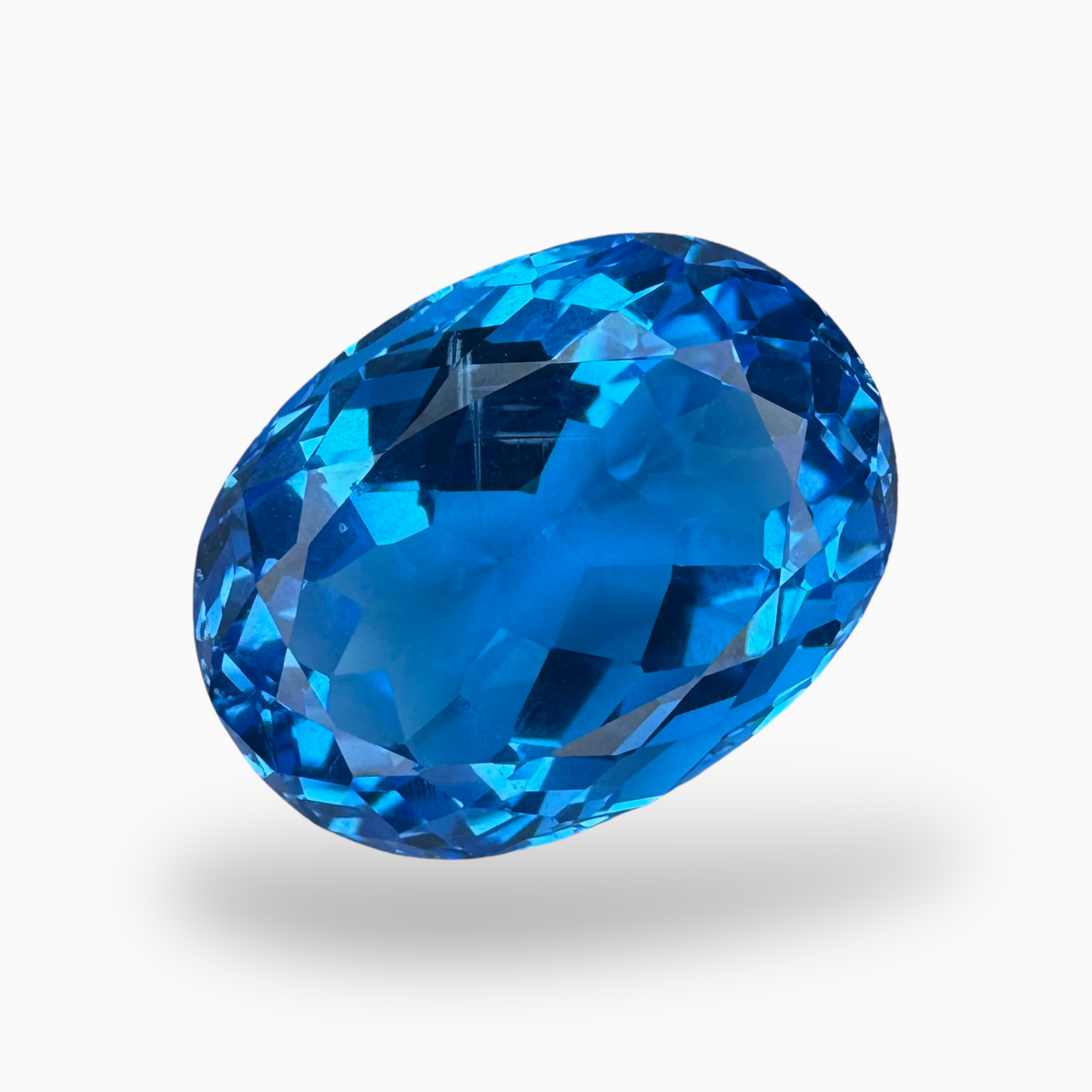 Deep Swiss Blue Topaz Oval Shape 27.90 Carats Stone Size 20X15mm