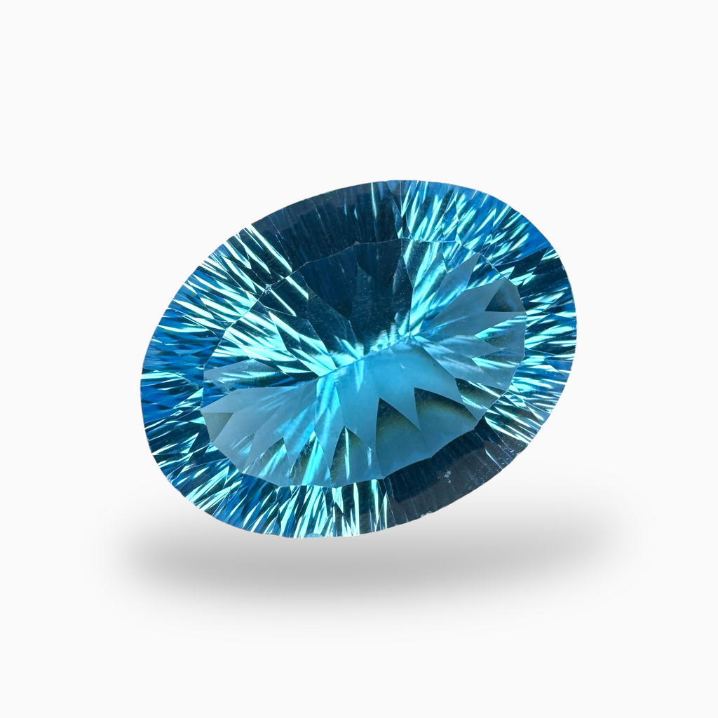 Swiss Blue Topaz Oval Shape 31.0 Carats Stone Size 23X17.5mm Fancy Laser Cut