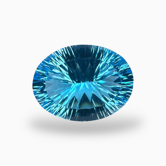 Swiss Blue Topaz Oval Shape 31.0 Carats Stone Size 23X17.5mm Fancy Laser Cut