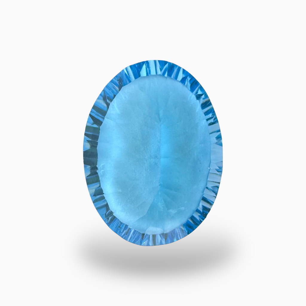 Swiss Blue Topaz Oval Shape 31.0 Carats Stone Size 23X17.5mm Fancy Laser Cut