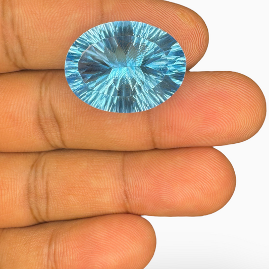 Swiss Blue Topaz Oval Shape 31.0 Carats Stone Size 23X17.5mm Fancy Laser Cut