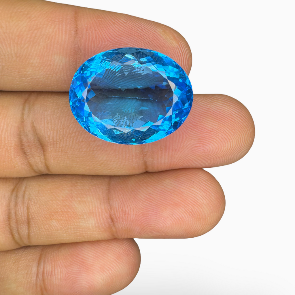 Deep Swiss Blue Topaz Oval Shape 32.60 Carats Stone Size 21X16.5mm