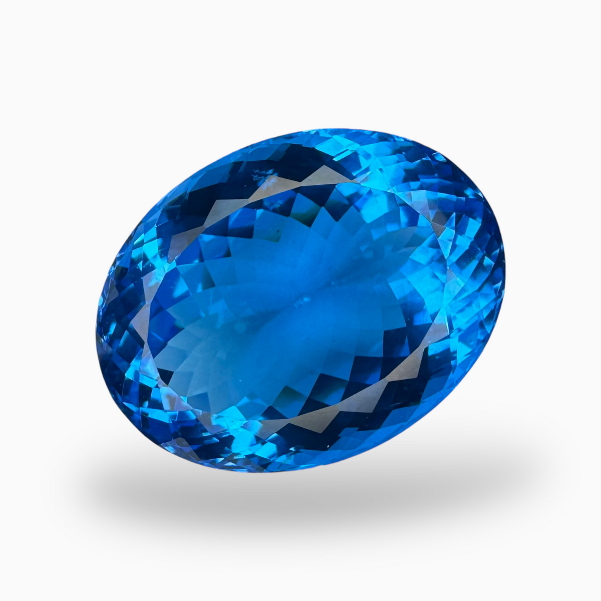 Deep Swiss Blue Topaz Oval Shape 46.73 Carats Stone Size 25X19mm