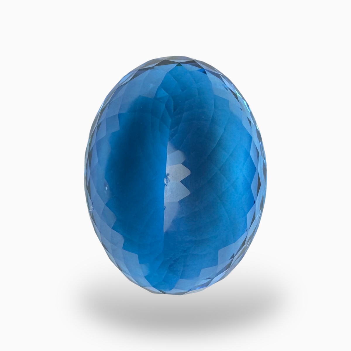 Deep Swiss Blue Topaz Oval Shape 46.73 Carats Stone Size 25X19mm