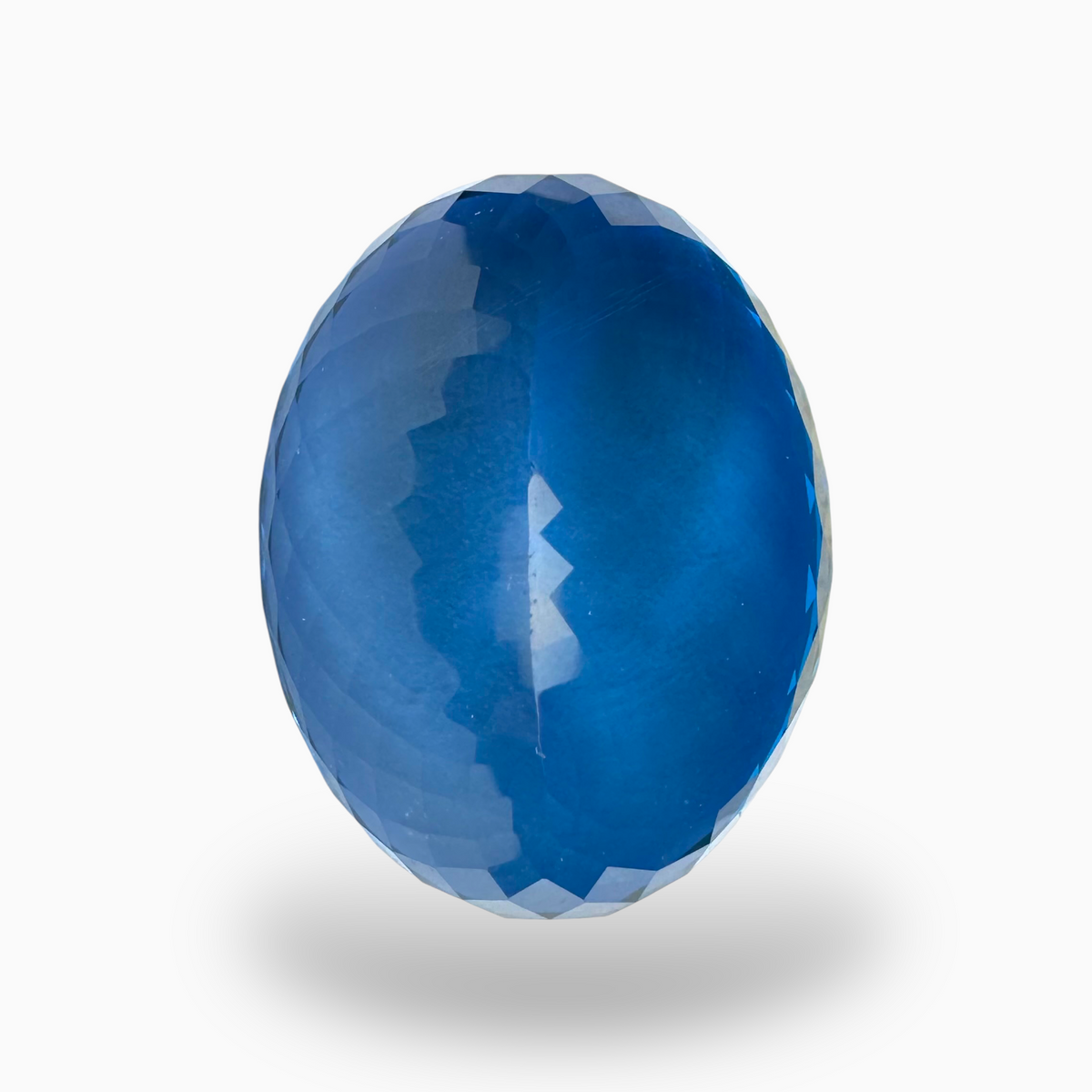 Deep Swiss Blue Topaz Oval Shape 51.60 Carats Stone Size 25X19mm