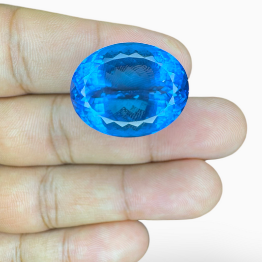 Deep Swiss Blue Topaz Oval Shape 51.60 Carats Stone Size 25X19mm