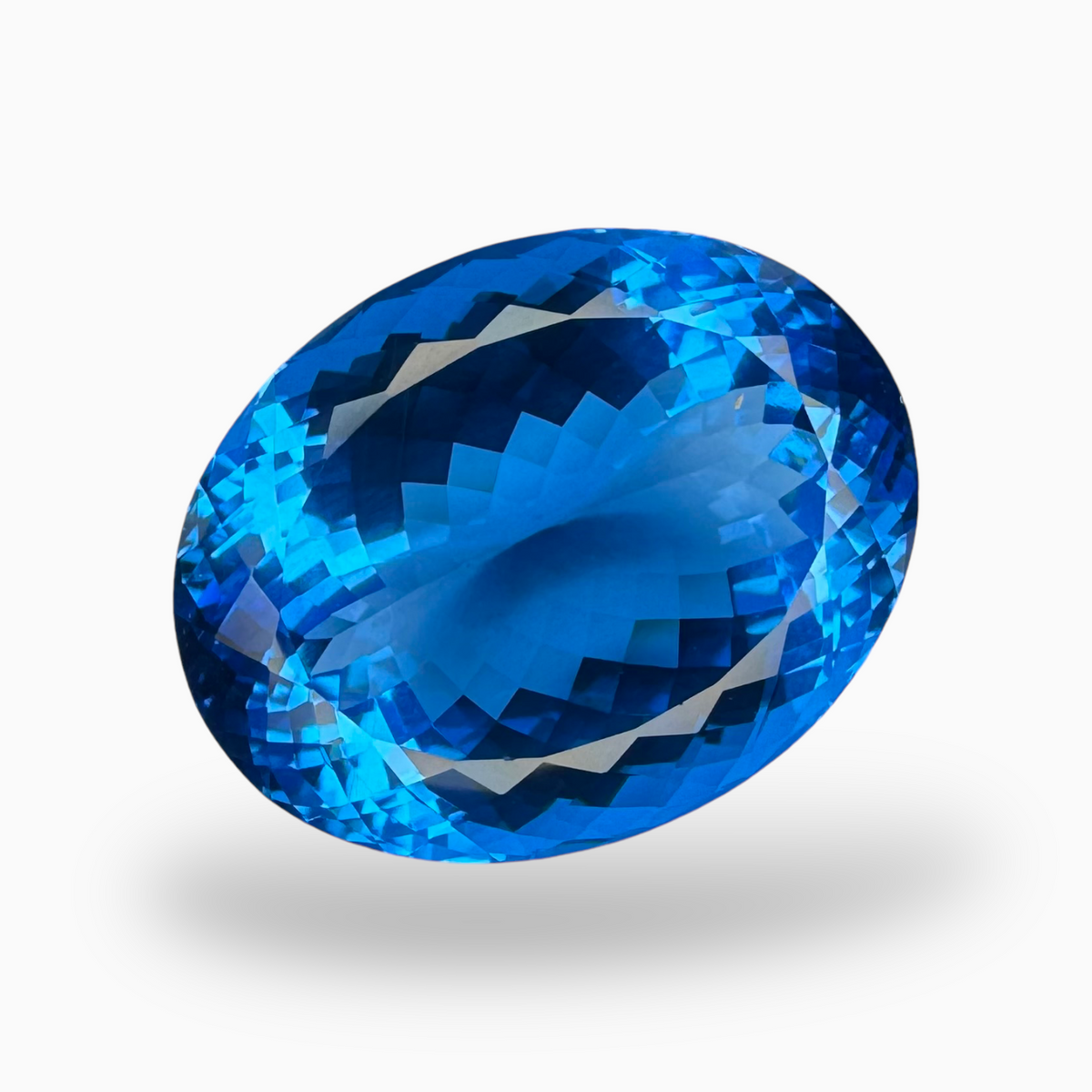 Deep Swiss Blue Topaz Oval Shape 51.60 Carats Stone Size 25X19mm