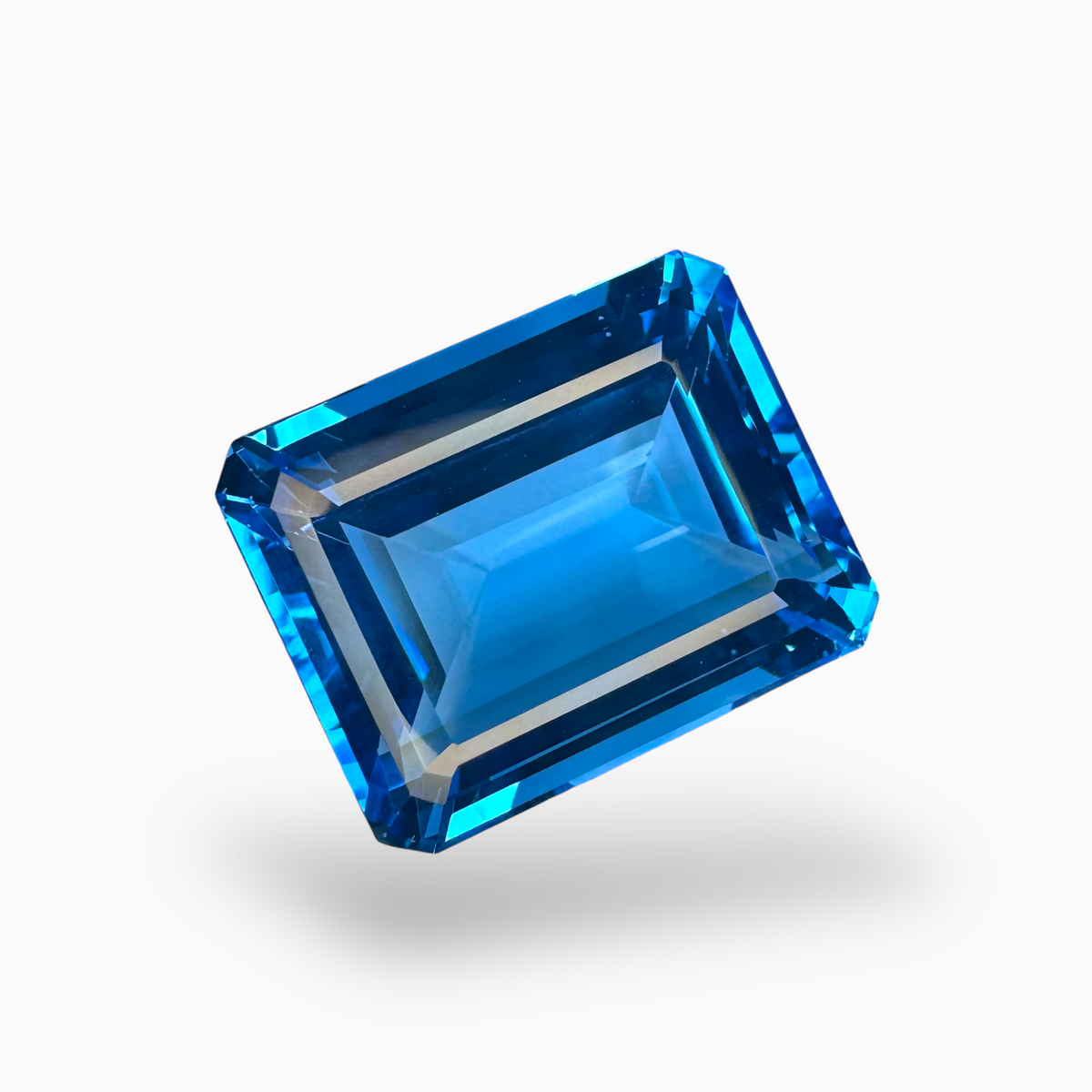 Swiss Blue Topaz Emerald Cut Shape 43.84 Carats Stone Size 21X16mm