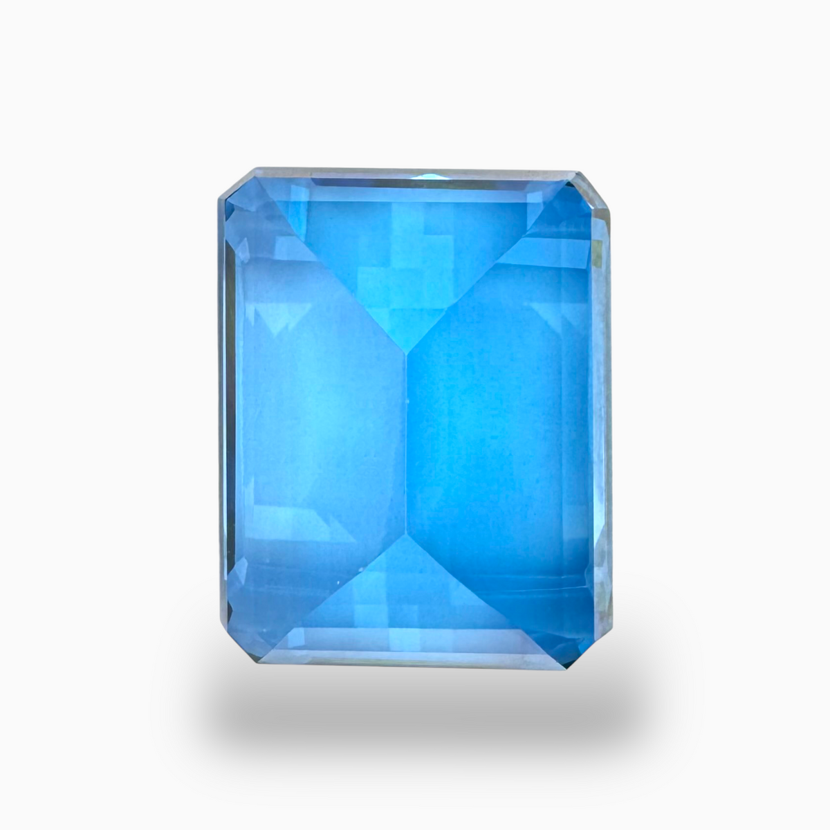 Swiss Blue Topaz Emerald Cut Shape 43.84 Carats Stone Size 21X16mm