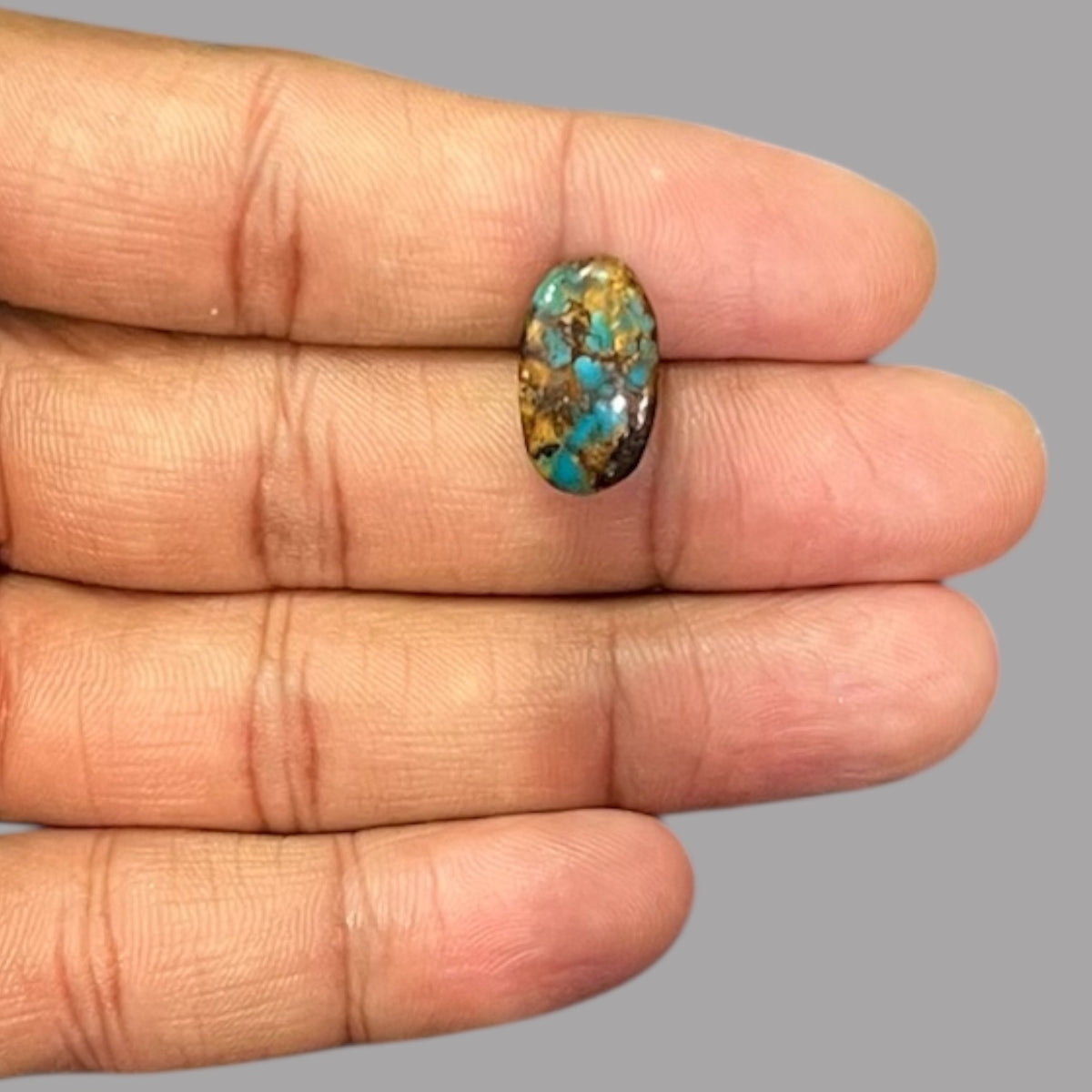 Turquoise Cabochon 7.14 Carats 16.5 x 9.7 x 5.7 mm in Oval