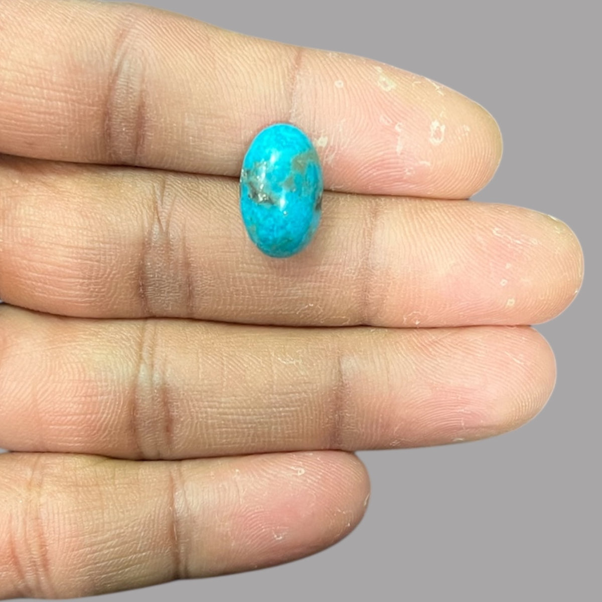 Turquoise Gemstone For Sale 7.10 Carats 16 x 10.1 x 6.5 mm in Oval