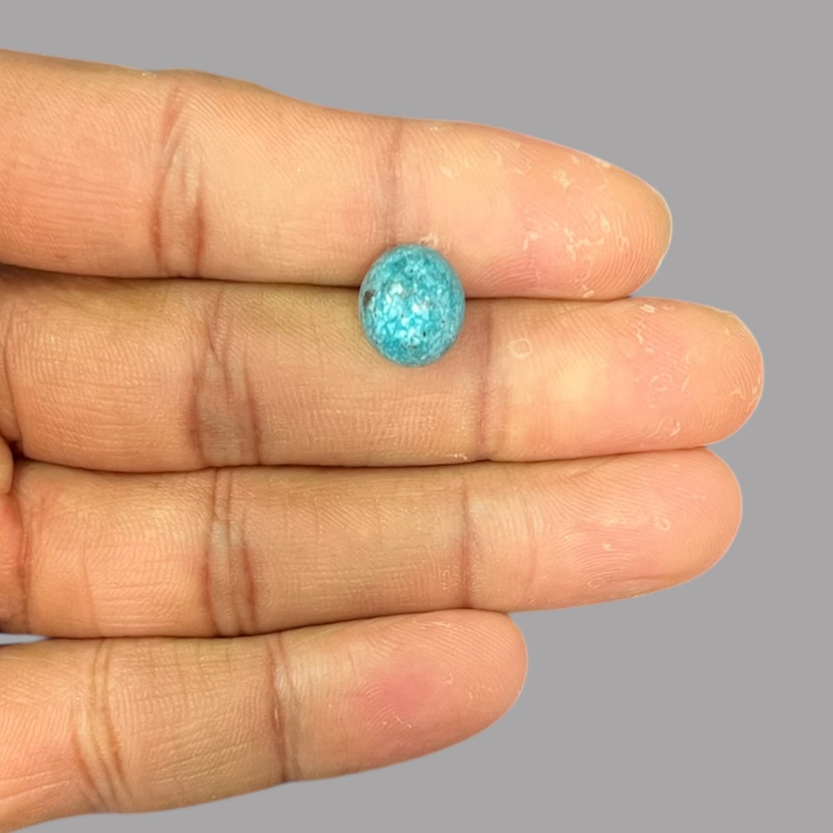 Turquoise Stone 6.40 Carats 11.6 x 10.2 x 7.6 mm in Oval
