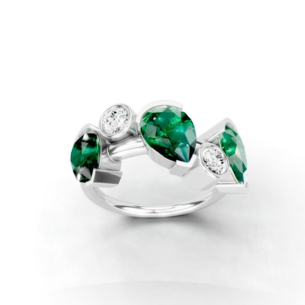Lumina Trio: Pear-Cut Emerald and Diamond Ring
