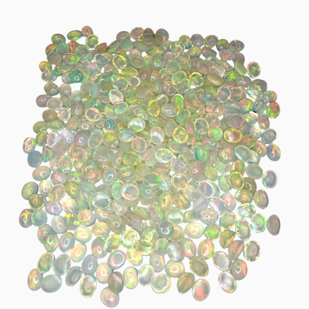 Natural White Color Ethiopian Opal Stone 0.22 Carats Oval Cabochon Shape 5X4mm