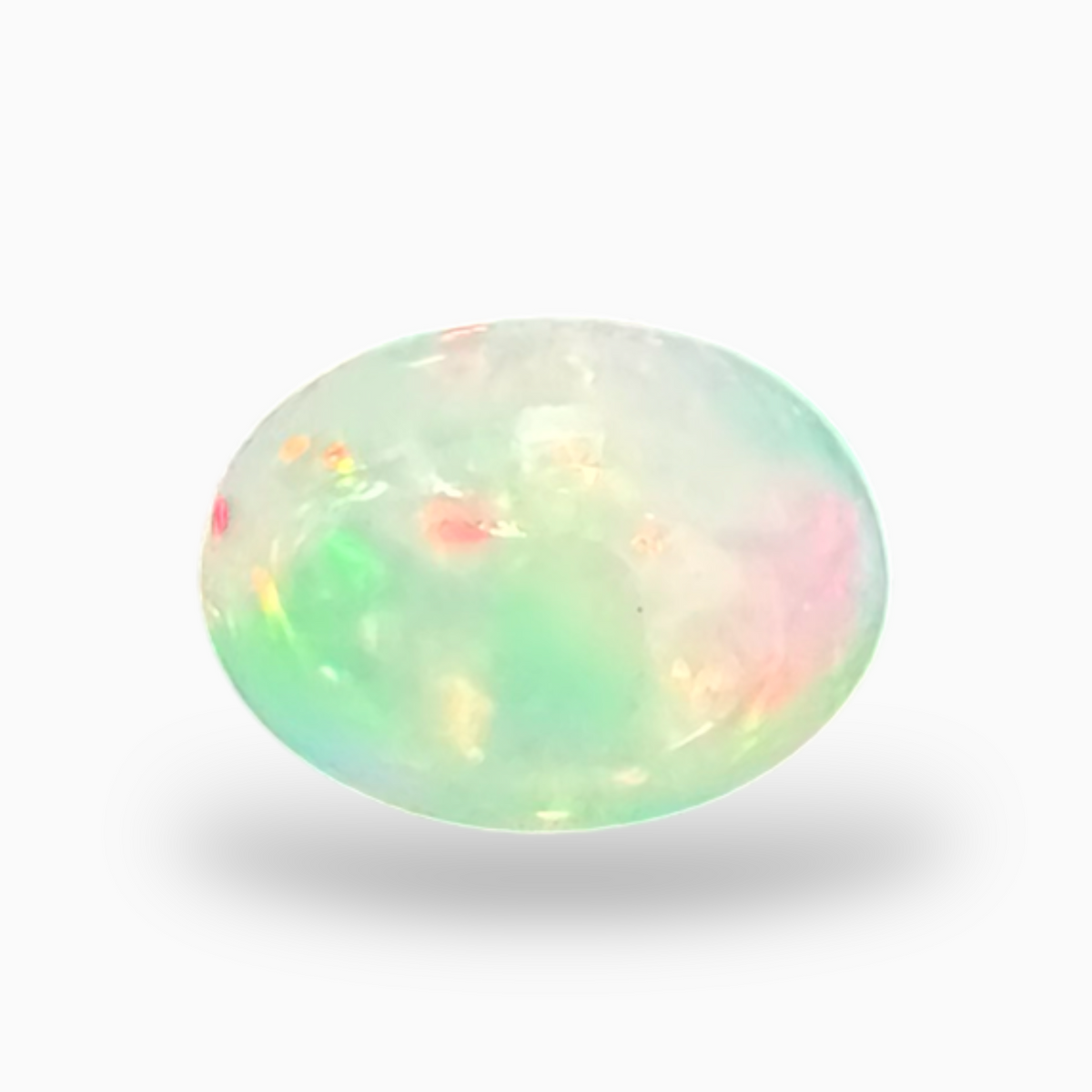 Natural White Color Ethiopian Opal Stone 0.61 Carats Oval Cabochon Shape  7X5mm