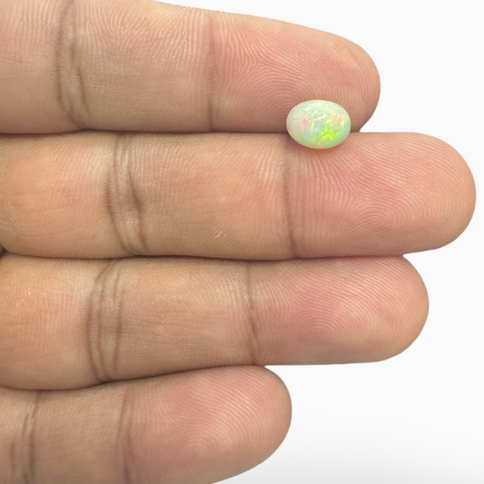 Natural White Color Ethiopian Opal Stone 0.8 Carats Oval Cabochon Shape 8X6mm