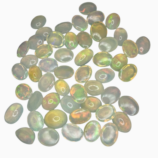 Natural White Color Ethiopian Opal Stone 1.2 Carats Oval Cabochon Shape 9X7mm