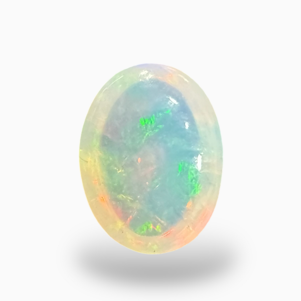Natural White Color Ethiopian Opal Stone 1.2 Carats Oval Cabochon Shape 9X7mm