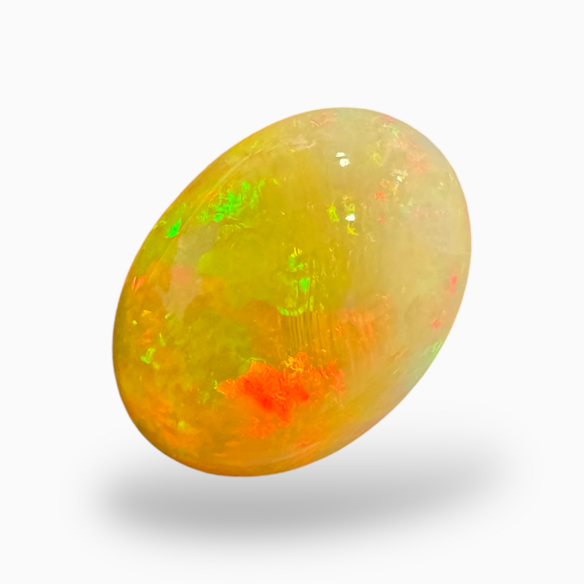 Natural Whitish Yellow Ethiopian Opal Stone 15.55  Carats Oval Cabochon Shape 13X17mm