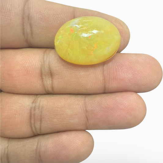 Natural Golden Ethiopian Opal Stone 19.23 Carats Oval Cabochon Shape 24.5X17.5mm