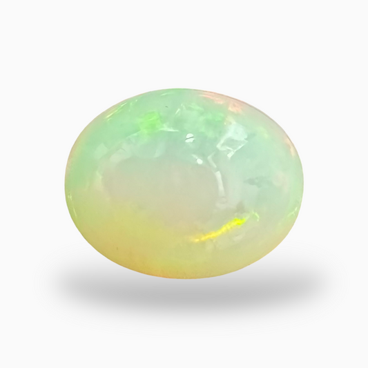 Natural White Color Ethiopian Opal Stone 6.05 Carats Oval Cabochon Shape 14X11mm