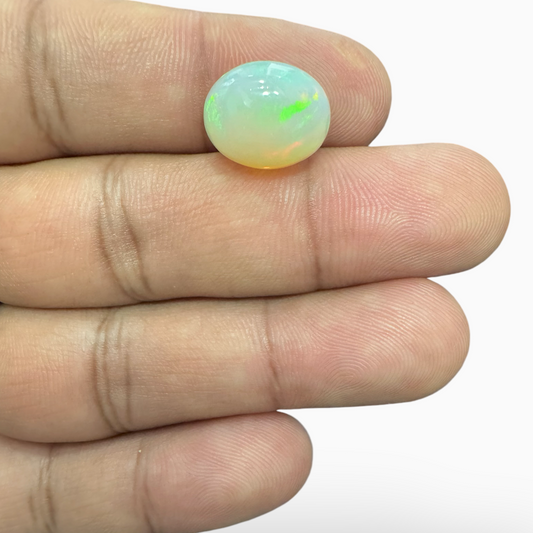 Natural White Color Ethiopian Opal Stone 6.05 Carats Oval Cabochon Shape 14X11mm