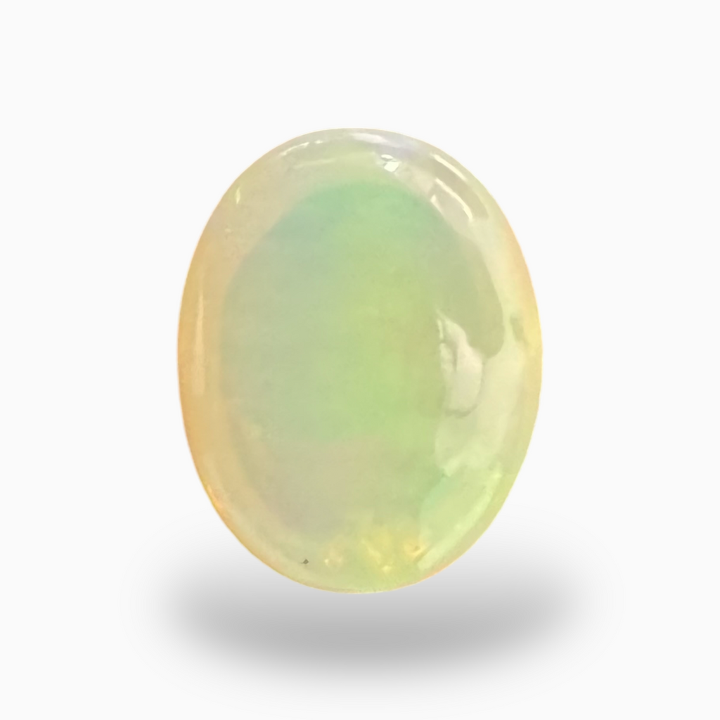 Natural White Color Ethiopian Opal Stone 6.05 Carats Oval Cabochon Shape 14X11mm