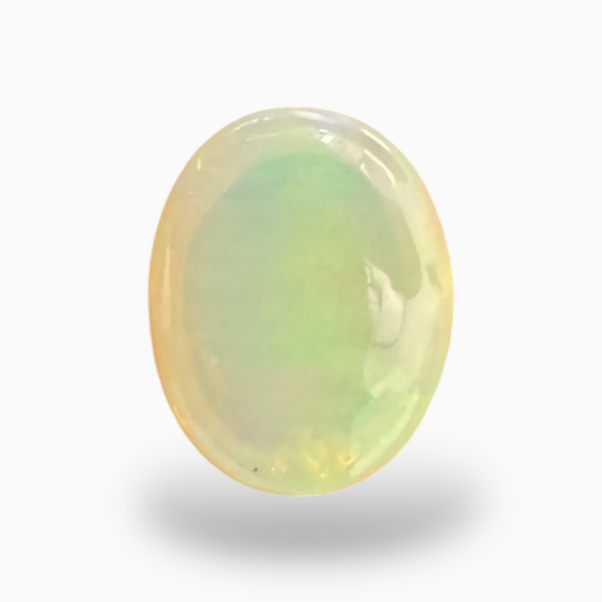Natural White Color Ethiopian Opal Stone 6.05 Carats Oval Cabochon Shape 14X11mm