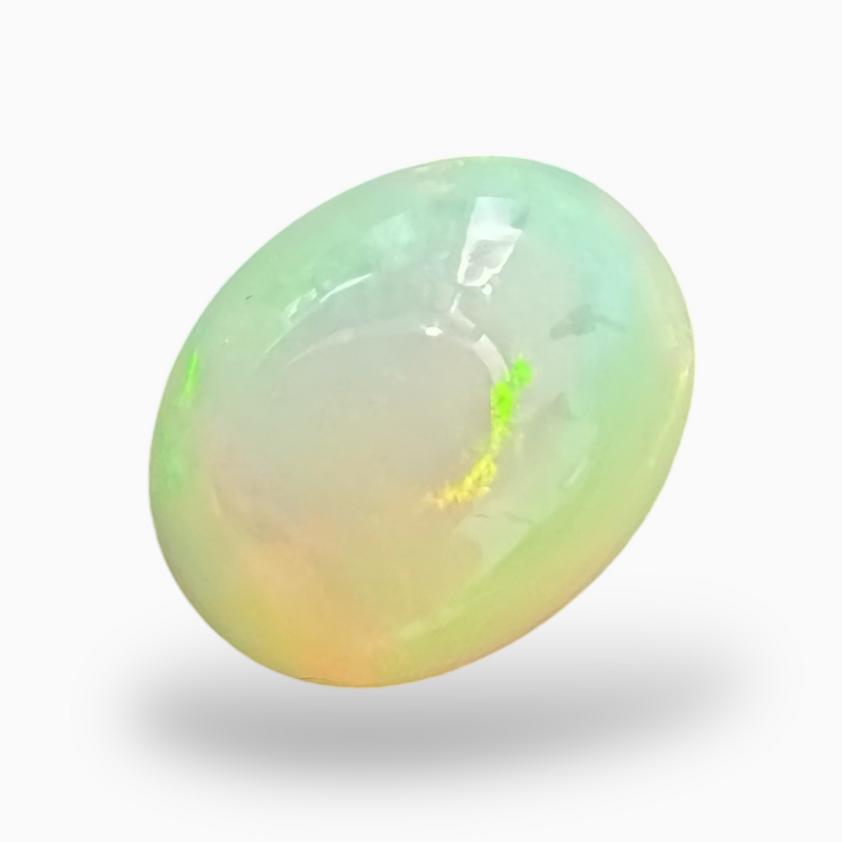 Natural White Color Ethiopian Opal Stone 6.05 Carats Oval Cabochon Shape 14X11mm