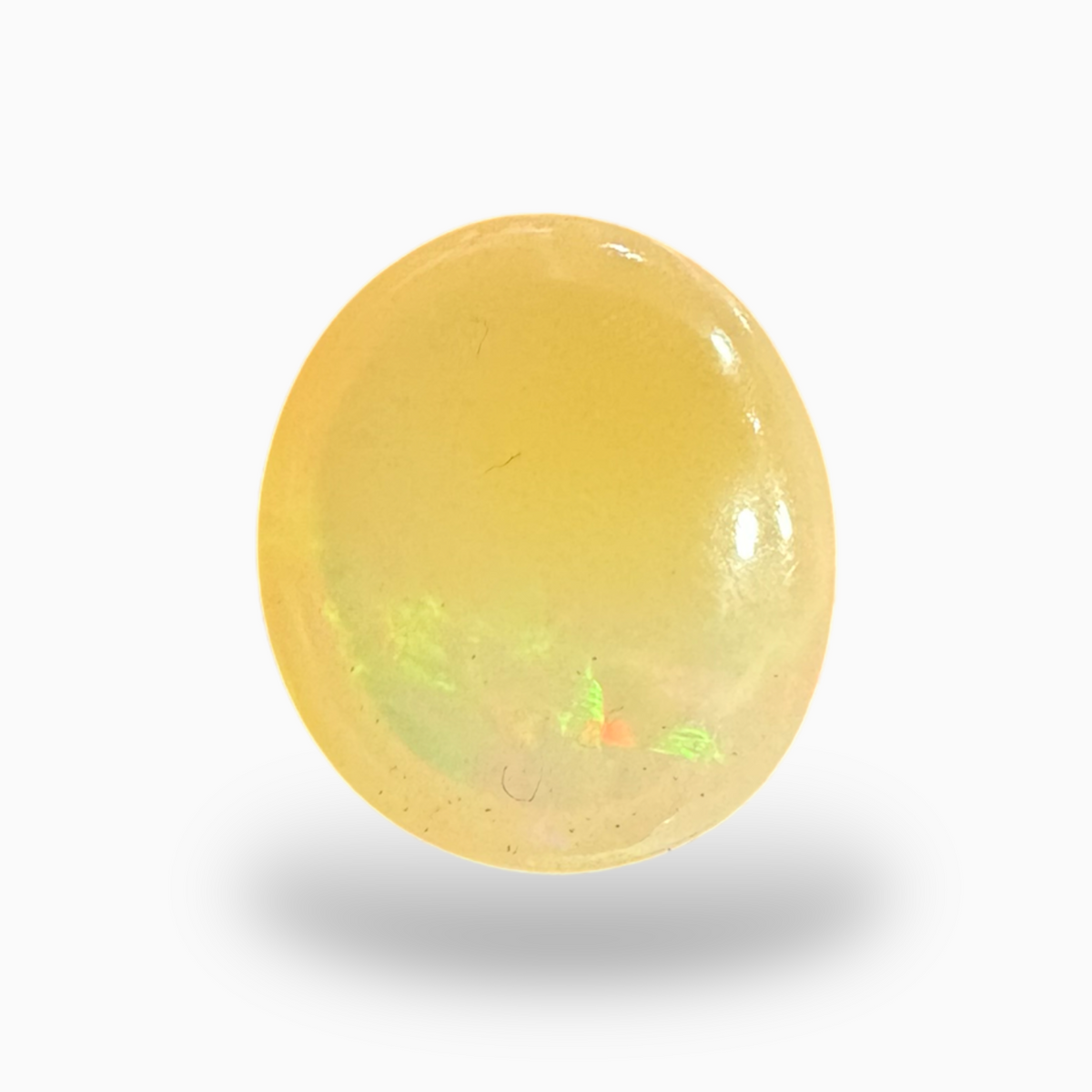 Natural White Ethiopian Opal Stone 6.72 Carats Oval Cabochon Shape 15.5X14mm