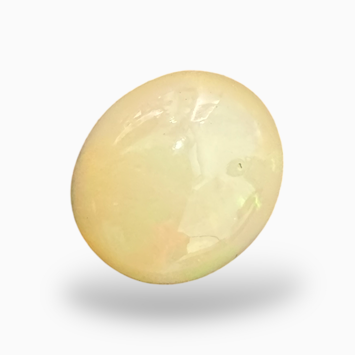 Natural White Ethiopian Opal Stone 6.72 Carats Oval Cabochon Shape 15.5X14mm