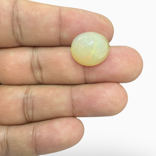 Natural White Ethiopian Opal Stone 6.72 Carats Oval Cabochon Shape 15.5X14mm