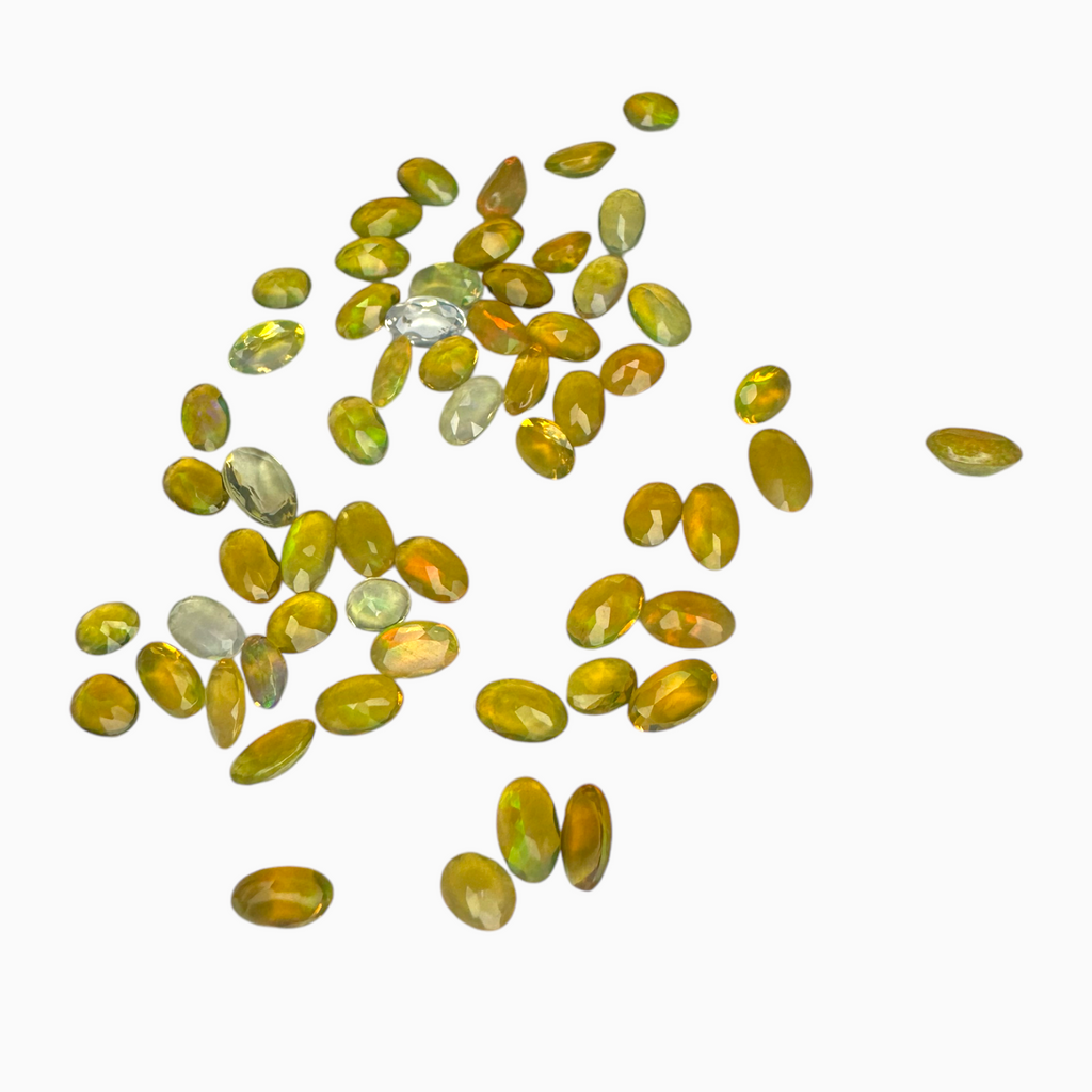 Natural Golden Color Ethiopian Opal Stone 0.16 Carats Oval Shape 5X4mm