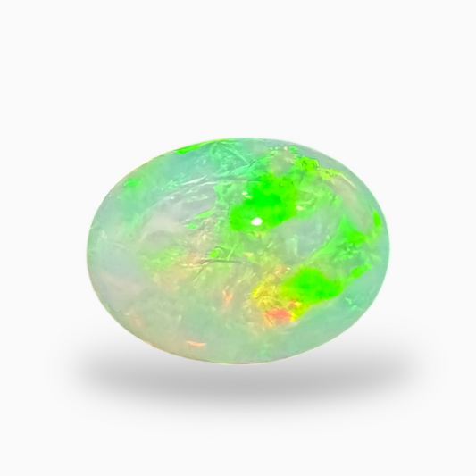 Natural White Color Ethiopian Opal Stone 1.2 Carats Oval Cabochon Shape 9X7mm