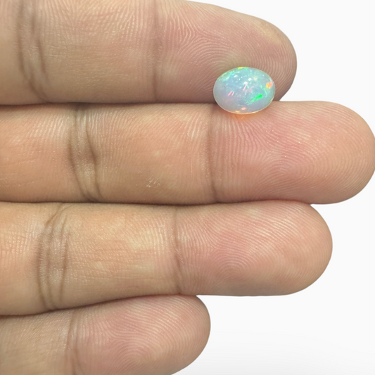 Natural White Color Ethiopian Opal Stone 1.2 Carats Oval Cabochon Shape 9X7mm