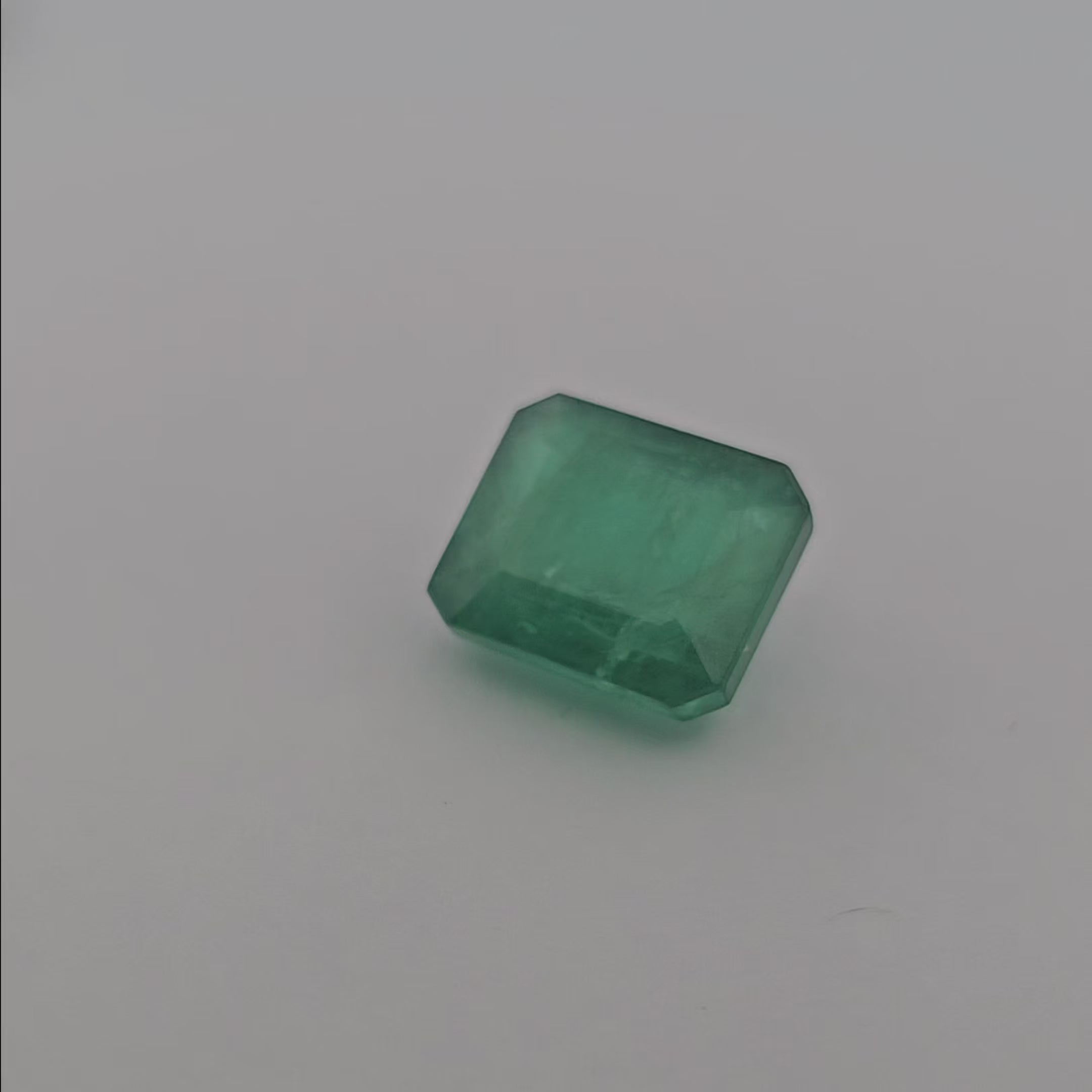  Natural Zambian Emerald Stone 8.41 Carats Emerald Cut 12.6 x 10.8  mm Rich text editor