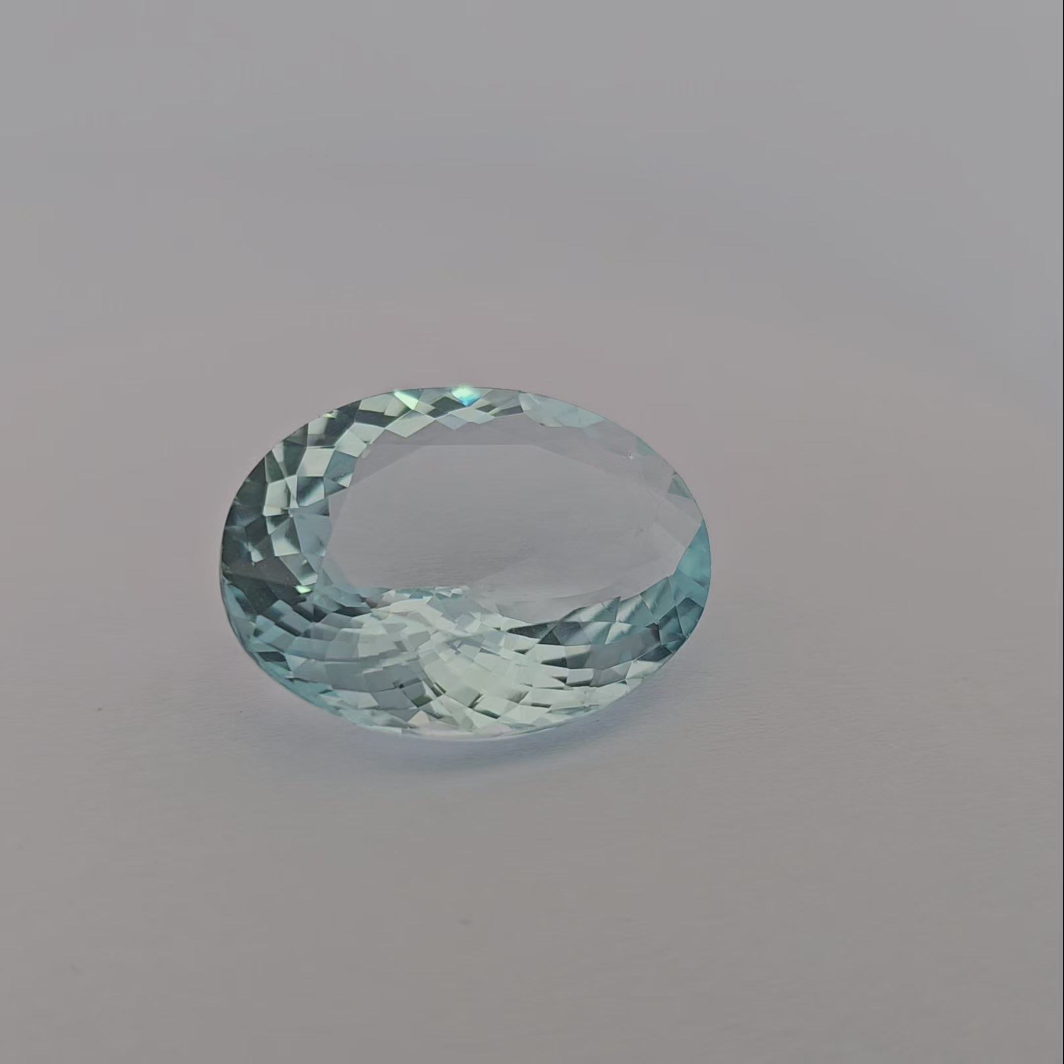 loose Natural Aquamarine Stone 27.81 Carats Oval Shape 20.5 x 16.7 mm