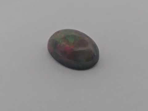 Natural Black Ethiopian Opal  Stone 9.44 Carats Oval Cabochon Shape  ( 18.5x13 mm )
