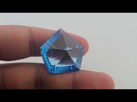 Fancy Shape Natural Blue Topaz in 50 Carats with 27 by 25 mm Size For Sale