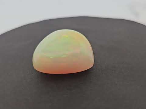 for sale  Natural White Ethiopian Opal  Stone 31.31 Carats Trilliant Cabochon Shape  ( 23.5 mm )