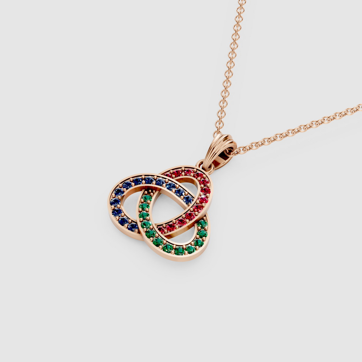 Natural Ruby, Emerald & Sapphire Celtic Trinity Knot Pendant in 18K Gold